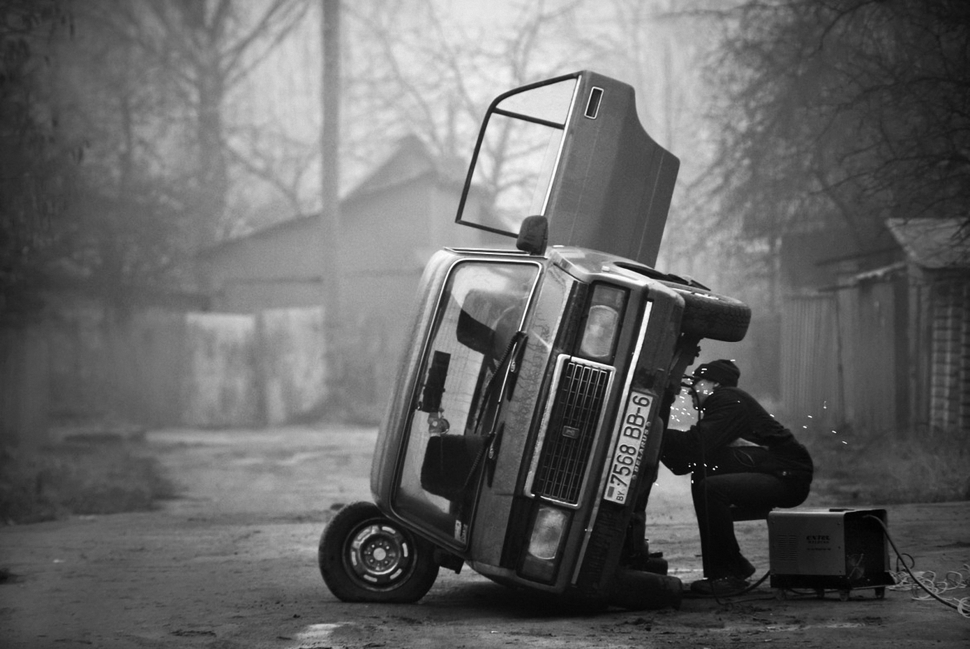 Name:  man-repairing-the-old-soviet-car-on-the-outskirts-of-the-city-of-mogilev-in-eastern-belarus-by-m.jpg
Views: 394
Size:  1.23 MB